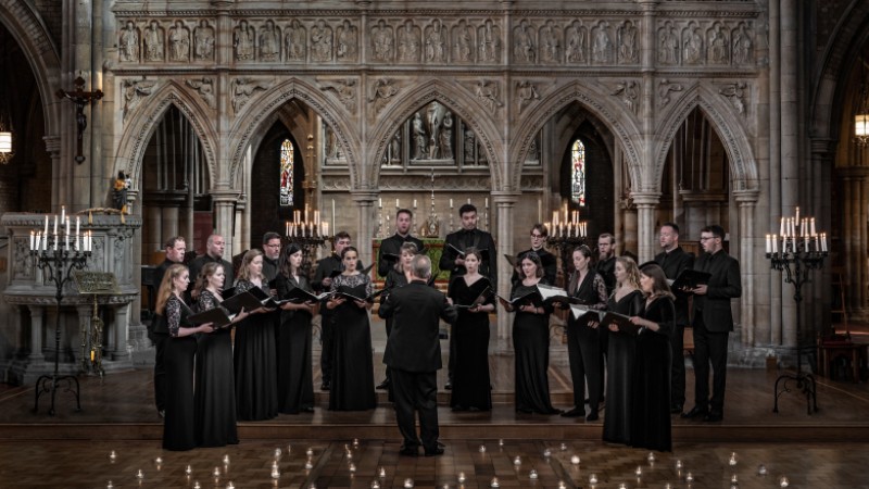 The members of Tenebrae performing in what appears to be a plave of worship.