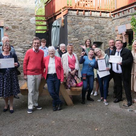happy volunteers outside narrows celebrate awards
